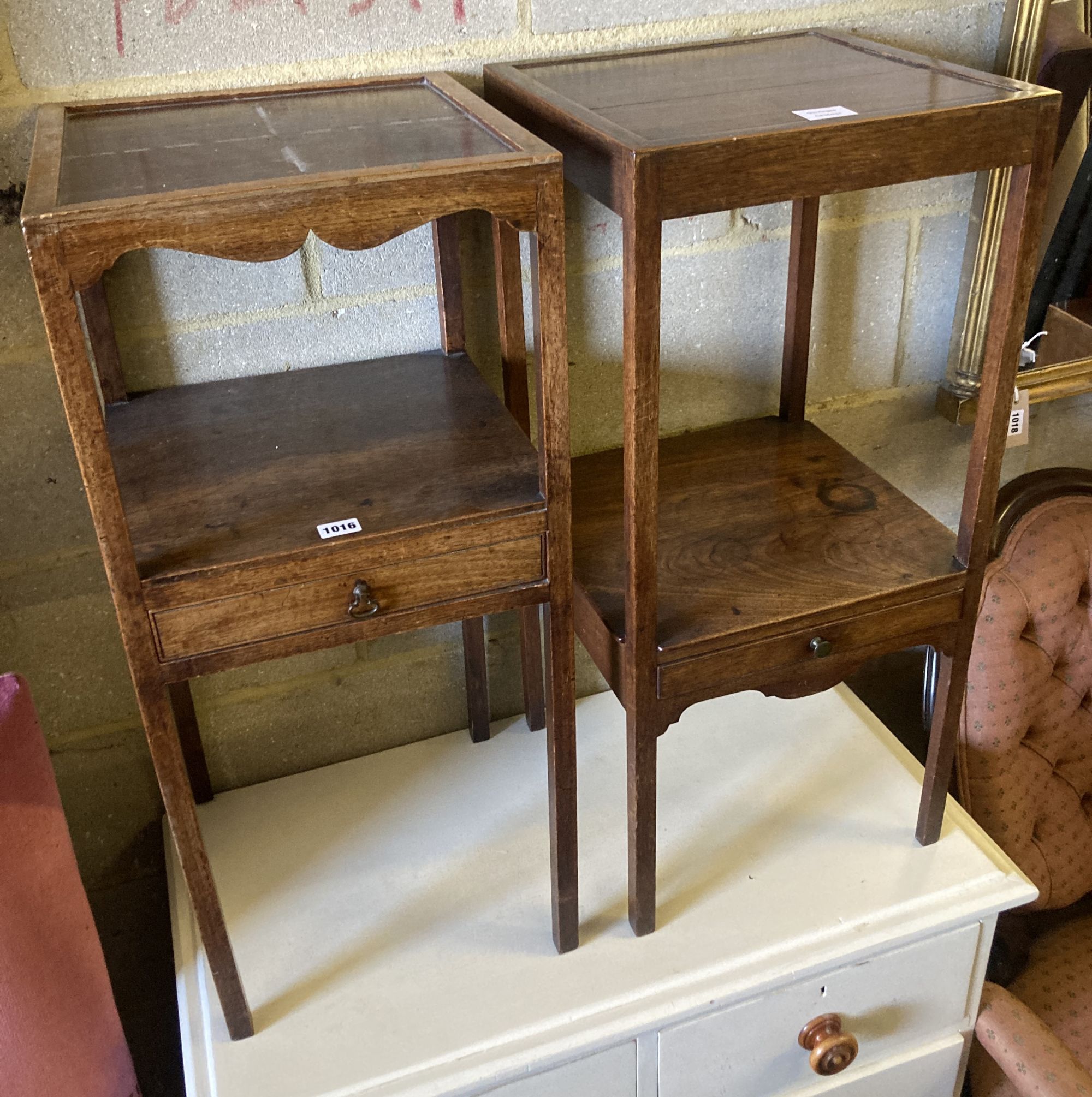 A near pair of George III mahogany washstands, larger width 35cm, depth 35cm, height 79cm